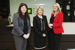 Mary McKeogh (centre) congratulating Sarah Kelly (left) & Anne Hogan (right) on their recent promotions.